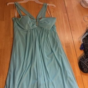 Light blue dress with gem in center